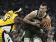 Indiana Pacers' Pascal Siakam fouls Milwaukee Bucks' Danilo Gallinari during the first half of Game 5 of the NBA playoff basketball series Tuesday, April 30, 2024, in Milwaukee. (AP Photo/Morry Gash)