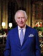 Britain\'s King Charles III delivers his message during the recording of his first Christmas broadcast in the Quire of St George\'s Chapel at Windsor Castle, Berkshire, England, Tuesday, Dec. 13, 2022. King Charles III evoked memories of his late mother, Queen Elizabeth II, as he broadcast his first Christmas message as monarch on Sunday, Dec. 25, 2022, in a speech that also paid tribute to the “selfless dedication” of Britain’s public service workers, many of whom are in a fight with the government over pay. (Victoria Jones/Pool Photo via AP)