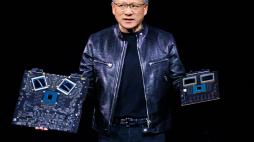 NVIDIA's CEO Jensen Huang displays products on-stage during the annual Nvidia GTC Artificial Intelligence Conference at SAP Center in San Jose, California, on March 18, 2024. (Photo by JOSH EDELSON / AFP)