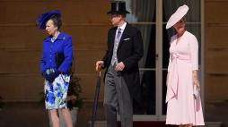 Britain's Princess Anne, Princess Royal (L), Britain's Prince Edward, Duke of Edinburgh (C) and Britain's Sophie, Duchess of Edinburgh attend a Royal Garden Party at Buckingham Palace, central London, on May 8, 2024. (Photo by Jordan Pettitt / POOL / AFP)