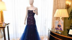 Princess Diana's 1986 midnight-blue Murray Arbeid dress, is on display at Julien's Auctions' press preview of "Princess Diana's Elegance & a Royal Collection", ahead of an exclusive private showing at the Peninsula Beverly Hills, Beverly Hills, California, June 25. (Photo by VALERIE MACON / AFP)