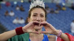 Antonella Palmisano, of Italy, celebrates after winning the women's 20 km race walk at the the European Athletics Championships in Rome, Friday, June 7, 2024. (AP Photo/Andrew Medichini)