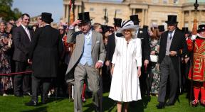LONDON, ENGLAND - MAY 8: King Charles III and Queen Camilla attending a Royal Garden Party at Buckingham Palace on May 8, 2024 in London, England.  (Photo by Jordan Pettitt - Pool/Getty Images)