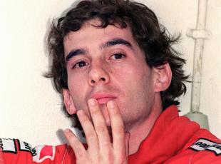 TO GO WITH STORYS ON THE 10TH ANNIVERSAY OF THE DEATH OF BRAZILIAN F1 RACING DRIVER AYRTON SENNA : (FILES) - Brazilian Formula One champion Ayrton Senna looks thoughtful in the pits of the Estoril racetrack during the Portugal Grand prix, 24 September 1989. Ayrton Senna died the 1st May 1994 in a crash during the San Marino Grand Prix, at the Imola racetrack in Italy.   AFP PHOTO JEAN-LOUP GAUTREAU