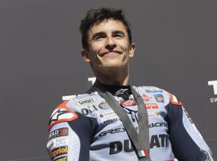 SCARPERIA, ITALY - JUNE 01:  Marc Marquez of Spain and Gresini Racing MotoGP celebrates the second place on the podium on track during the MotoGP Of Italy - Sprint at Mugello Circuit on June 01, 2024 in Scarperia, Italy. (Photo by Mirco Lazzari gp/Getty Images)