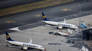(FILES) This aerial view taken on July 29, 2022 shows Ryanair aircrafts on the tarmac at Bordeaux-Merignac Airport in Merignac, southwest France. Ryanair's base at Bordeaux-Merignac airport will close next November "due to rising costs", the Irish airline announced on May 14, 2024. (Photo by Thibaud MORITZ / AFP)