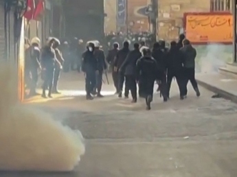 This grab taken on January 6, 2026, from UGC images posted on social media the same day shows Iranian security forces using tear gas to disperse demonstrators in the Tehran bazaar. Iran will offer no leniency to "rioters", though the public has a ...