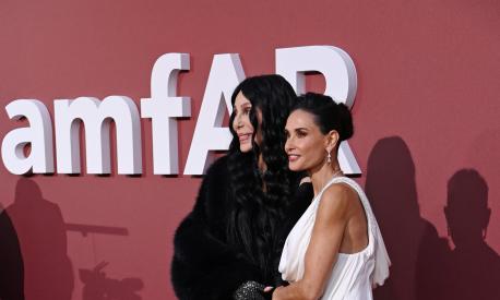 CAP D'ANTIBES, FRANCE - MAY 23: Cher and Demi Moore attend the amfAR Cannes Gala 30th edition Presented by Chopard and Red Sea International Film Festival at Hotel du Cap-Eden-Roc on May 23, 2024 in Cap d'Antibes, France. (Photo by Eamonn M. McCormack/Getty Images)
