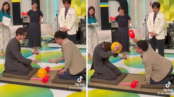 Damiano David nel game-show giapponese alle prese con una 'pericolosa' morra: indossa l'elmetto per parare la martellata sulla testa