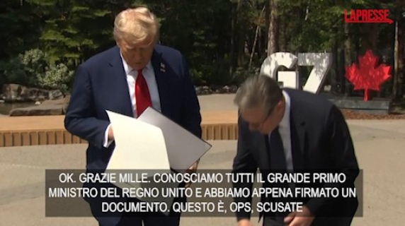 La gaffe di Trump al G7: prima fa cadere i fogli dell'accordo, poi inserisce la Gran Bretagna nell'Ue