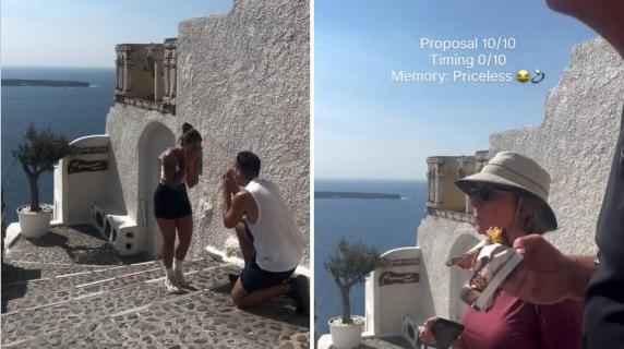 Piazza la telecamera per riprendere la proposta di matrimonio in Grecia: due turisti coprono la visuale e rovinano tutto