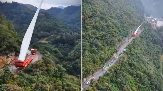 Camionista cinese affronta l’impossibile: trasporta una gigantesca pala eolica su una montagna