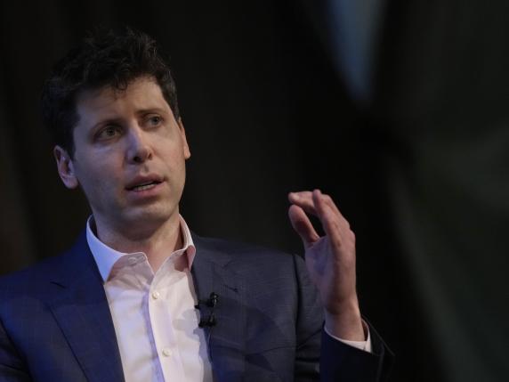 OpenAI's CEO Sam Altman, the founder of ChatGPT and creator of OpenAI gestures while speaking at University College London, as part of his world tour of speaking engagements in London, Wednesday, May 24, 2023.(AP Photo/Alastair Grant)