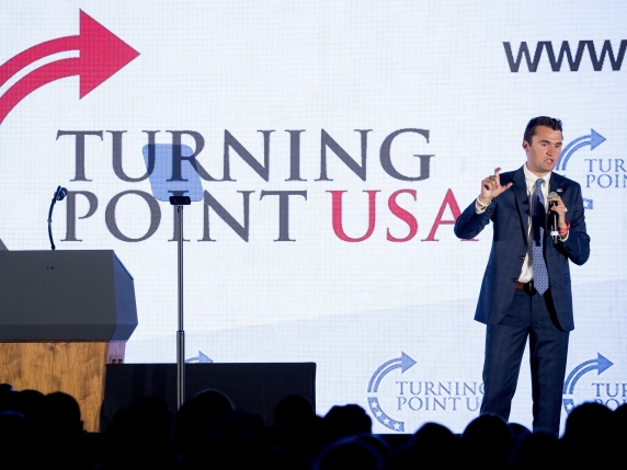 FILE - Turning Point USA Founder Charlie Kirk speaks at Turning Point USA Teen Student Action Summit at the Marriott Marquis in Washington, Tuesday, July 23, 2019. (AP Photo/Andrew Harnik, File)