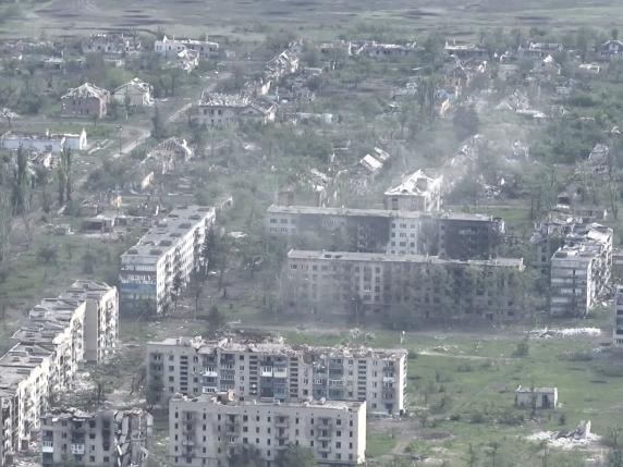 This photo taken from a drone video provided by Ukraine Patrol Police, shows devastation in Chasiv Yar, an eastern Ukrainian city Russia is assaulting, Ukraine, Monday, April 29, 2024. The footage shows the community of Chasiv Yar - which is set amid green fields and woodland - reduced to a skeletal ghost town with few residents left. The apocalyptic scene is reminiscent of the cities of Bakhmut and Avdiivka, which Ukraine yielded after months of bombardment and huge losses for the Kremlin?s forces. (Ukraine Patrol Police via AP)