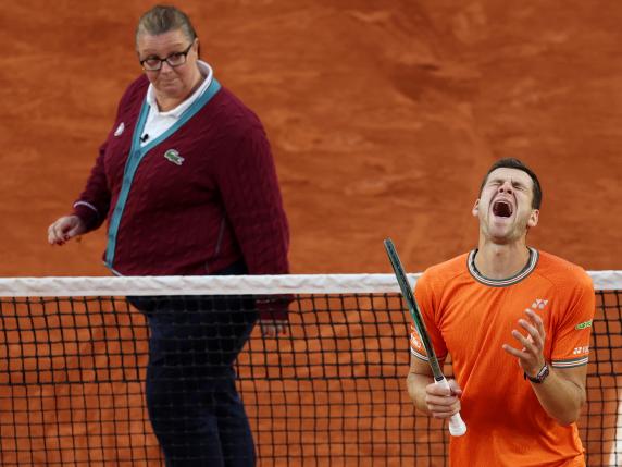 PARIS, FRANCE - JUNE 02: Hubert Hurkacz of Poland reacts after the ball was adjudged to be ruled out by the umpire during the Men's Singles Fourth Round match against Grigor Dimitrov of Bulgaria on Day Eight of the 2024 French Open at Roland Garros on June 02, 2024 in Paris, France. (Photo by Clive Brunskill/Getty Images) *** BESTPIX ***