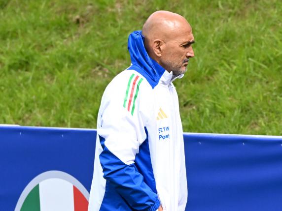 Italys head coach Luciano Spalletti walks on the pitch prior to a training session of the Italian team at the Hemberg Stadion Nord Halle in Iserlhon, Germany, 12 June 2024. ANSA/DANIEL DAL ZENNARO