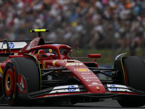 Ferrari driver Carlos Sainz of Spain steers his car during the third free practice ahead of Sunday's Formula One Hungarian Grand Prix auto race, at the Hungaroring racetrack in Mogyorod, near Budapest, Hungary, Saturday, July 20, 2024. (AP Photo/Denes Erdos)