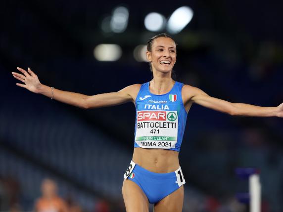 ROME, ITALY - JUNE 11: Gold medallist, Nadia Battocletti of Team Italy, celebrates as they cross the finish line to win in the Women's 10,000m Final on day five of the 26th European Athletics Championships - Rome 2024 at Stadio Olimpico on June 11, 2024 in Rome, Italy.  (Photo by Michael Steele/Getty Images)