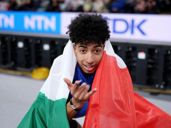 GLASGOW, SCOTLAND - MARCH 02: Silver medalist Mattia Furlani of Team Italy celebrates after the Men's Long Jump Final on Day Two of the World Athletics Indoor Championships at Emirates Arena on March 02, 2024 in Glasgow, Scotland. (Photo by Alex Pantling/Getty Images)