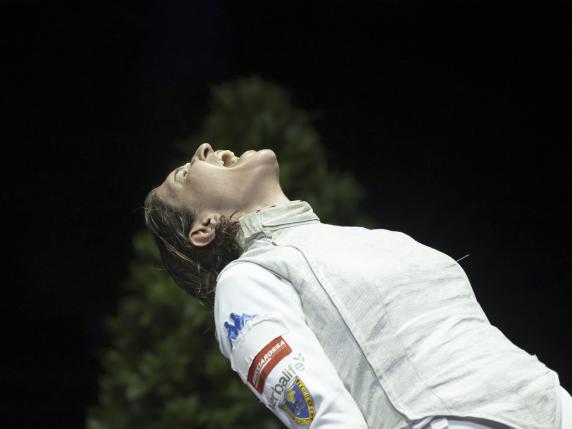 Italy's Arianna Errigo cheers after winning the gold medal bout of the Foil Women's Senior Individual competition of the Fencing Euro 2024 in Basel, Switzerland, on Wednesday, June 19, 2024. (Georgios Kefalas/AP via Keystone)