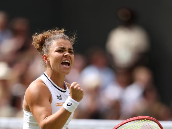 *** BESTPIX *** LONDON, ENGLAND - JULY 13: Jasmine Paolini of Italy celebrates a point as she plays against Barbora Krejcikova of Czechia during her Ladies' Singles Final match during day thirteen of The Championships Wimbledon 2024 at All England Lawn Tennis and Croquet Club on July 13, 2024 in London, England. (Photo by Clive Brunskill/Getty Images)