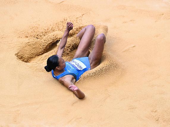 Italy's Larissa Iapichino competes in the women's long jump qualification of the athletics event at the Paris 2024 Olympic Games at Stade de France in Saint-Denis, north of Paris, on August 6, 2024. (Photo by Kirill KUDRYAVTSEV / AFP)