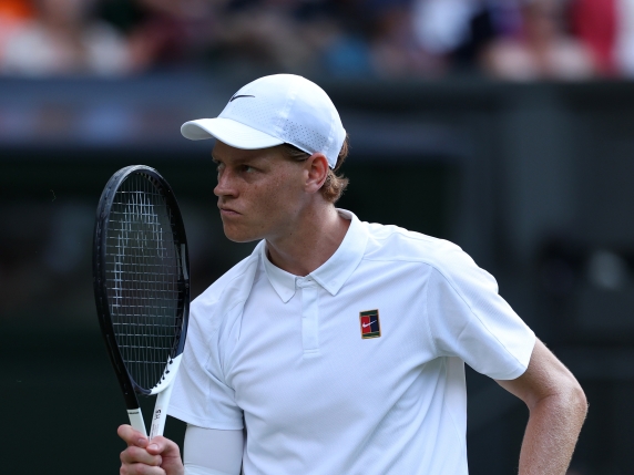 LONDON, ENGLAND - JULY 13: Jannik Sinner of Italy celebrates against Carlos Alcaraz of Spain during the Gentleman's Singles Final on day fourteen of The Championships Wimbledon 2025 at All England Lawn Tennis and Croquet Club on July 13, 2025 in London, England. (Photo by Julian Finney/Getty Images)