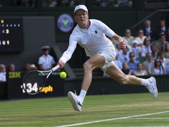 Jannik Sinner of Italy returns to Carlos Alcaraz of Spain during the men's singles final match at the Wimbledon Tennis Championships in London, Sunday, July 13, 2025.(AP Photo/Kirsty Wigglesworth)