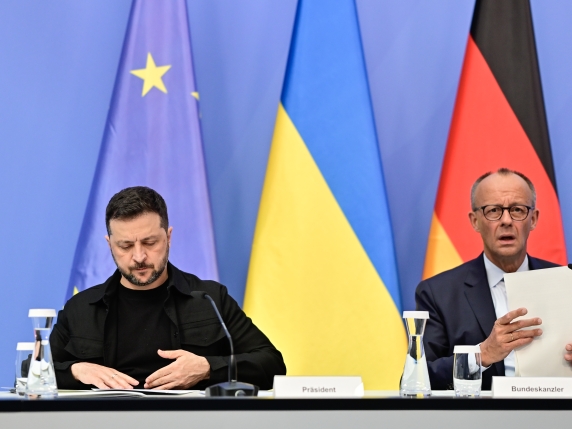 BERLIN, GERMANY - AUGUST 13: German Chancellor Friedrich Merz (R) and Ukrainian President Volodymyr Zelensky attend a virtual meeting between European leaders, Ukrainian President Volodymyr Zelensky and U.S. President Donald Trump on August 13, 20...