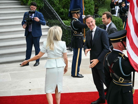 NATO Secretary-General Mark Rutte is greeted by US Chief of Protocol Monica Crowley (L) upon arrival at the White House South Portico in Washington, DC, on August 18, 2025. European leaders join Ukrainian President Volodymyr Zelensky in talks with...