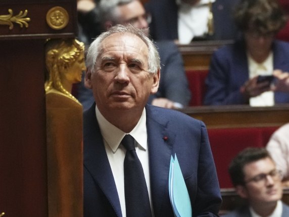 French Prime Minister Francois Bayrou arrives to address the National Assembly, prior to a parliamentary confidence vote that could bring him down, in Paris, France, Monday, Sept. 8, 2025. (AP Photo/Christophe Ena)