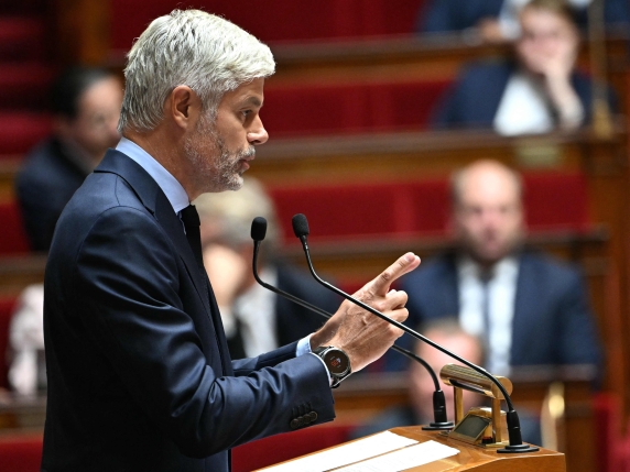 President of Droite Republicaine parliamentary group Laurent Wauquiez delivers a speech following prime Minister's general policy statement during the parliamentary extraordinary session prior to a confidence vote over the government's austerity b...