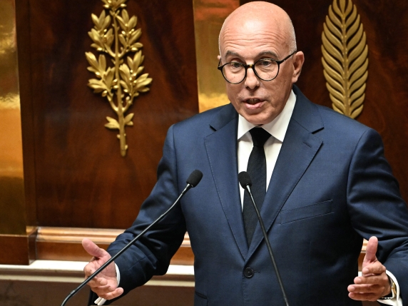 President of UDR parliamentary group Eric Ciotti arrives to deliver a speech following prime Minister's general policy statement during the parliamentary extraordinary session prior to a confidence vote over the government's austerity budget, at t...