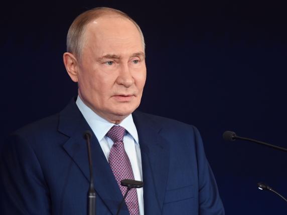 Russian President Vladimir Putin speaks at the Russian Geographical Society congress at the State Kremlin Palace in Moscow, Russia, Thursday, Oct. 23, 2025. (Kristina Kormilitsyna, Sputnik, Kremlin Pool Photo via AP)