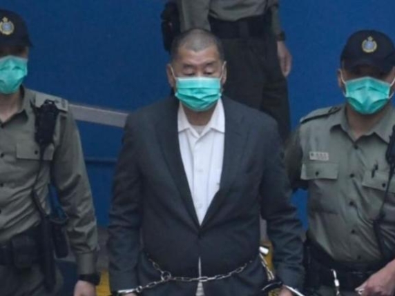 The son of Chinese activist Lai sentenced to 20 years: 'My father is ill, but to the judges he smiled: he is a real rights hero'