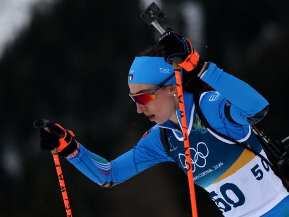 Italy's Lisa Vittozzi competes in the women's biathlon 15km individual event during the Milano Cortina 2026 Winter Olympic Games at the Anterselva Biathlon Arena (Sudtirol Arena) in Anterselva (Val Pusteria) on February 11, 2026. (Photo by FRANCK ...