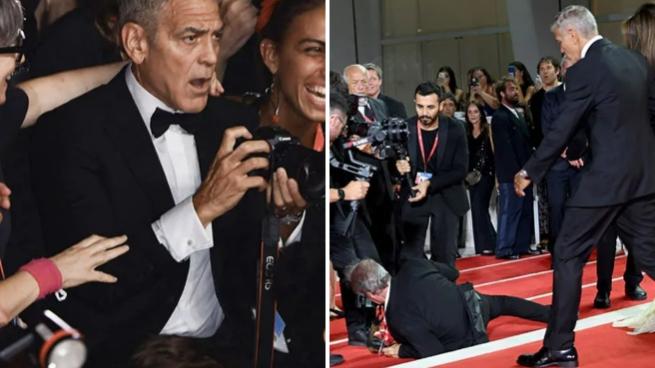 Venezia, George Clooney interviene a rialzare un fotografo caduto sul red carpet