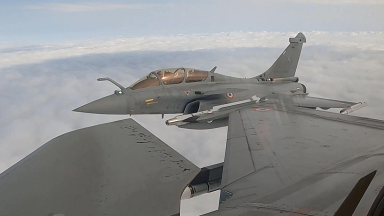 TOPSHOT - This handout video grab recorded on September 13, 2025, and released on September 14, 2025, by the French Army (Etat Major des Armees), shows a French Air Force Dassault Rafale B fighter jet configured for air-to-air weaponry deployed at...