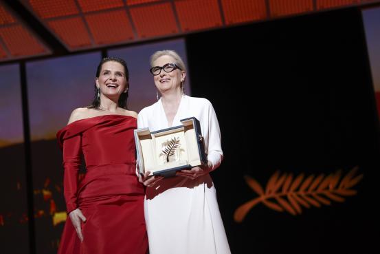 Juliette Binoche, left, and Meryl Streep during the opening ceremony of the 77th international film festival, Cannes, southern France, Tuesday, May 14, 2024. (Photo by Vianney Le Caer/Invision/AP)