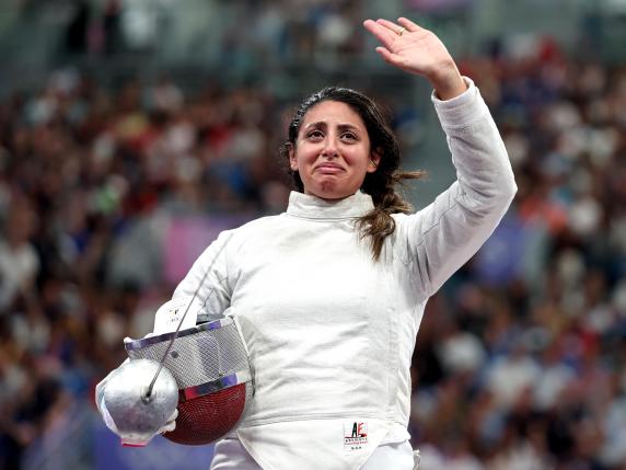 PARIS, FRANCE - JULY 29: Nada Hafez of Team Egypt applauds fans after her victory against Elizabeth Tartakovsky of Team United States (not pictured) in the Fencing Women's Sabre Individual Table of 32 on day three of the Olympic Games Paris 2024 at Grand Palais on July 29, 2024 in Paris, France. (Photo by Al Bello/Getty Images)