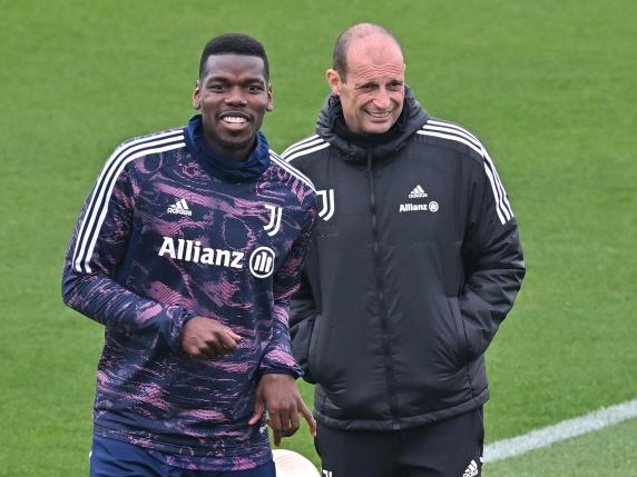 Juventus' Paul Pogba and head coach Massimiliano Allegri during the training session on the eve of the UEFA Europa League quarter final match Juventus FC -Sporting Clube de Portugal at the JTC Continassa, Turin, Italy, 12 April 2023. ANSA / ALESSANDRO DI MARCO