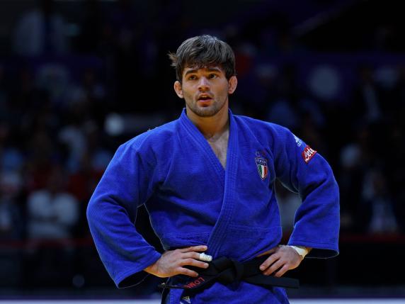 Italy's Manuel Lombardo reacts as he competes in the men's -73Kg final bout at the World Judo Championships in Doha on May 9, 2023. (Photo by KARIM JAAFAR / AFP)