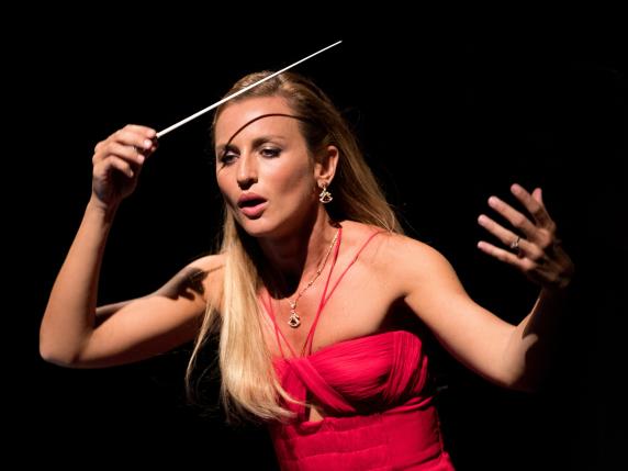 MILAN, ITALY - OCTOBER 14: Beatrice Venezi performs on stage during "Gianni Schicchi - Suor Angelica" on October 14, 2021 in Milan, Italy. (Photo by Jacopo Raule/Getty Images)