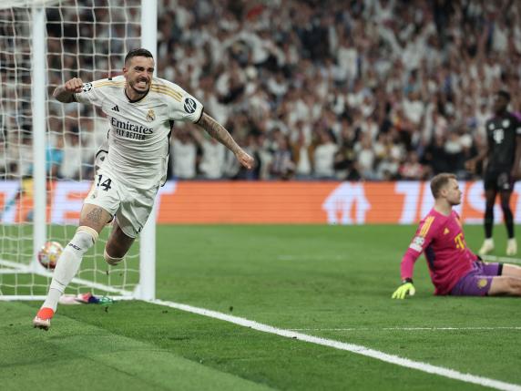 TOPSHOT - Real Madrid's Spanish forward #14 Joselu celebrates scoring his team's first goal during the UEFA Champions League semi final second leg football match between Real Madrid CF and FC Bayern Munich at the Santiago Bernabeu stadium in Madrid on May 8, 2024. (Photo by Thomas COEX / AFP)