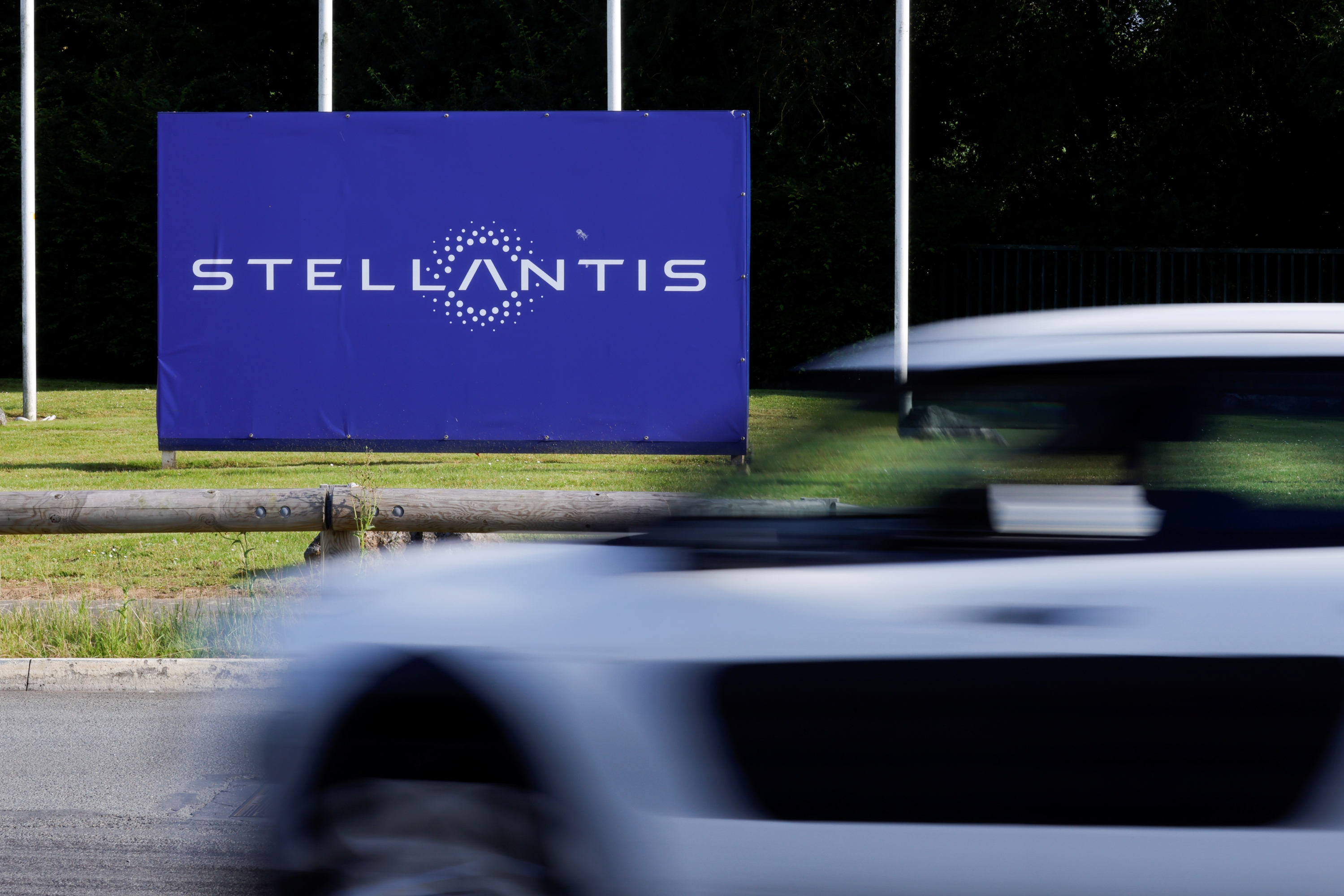 A view shows the logo of Stellantis at the entrance of the company's factory in Hordain, France, July 7, 2021. REUTERS/Pascal Rossignol