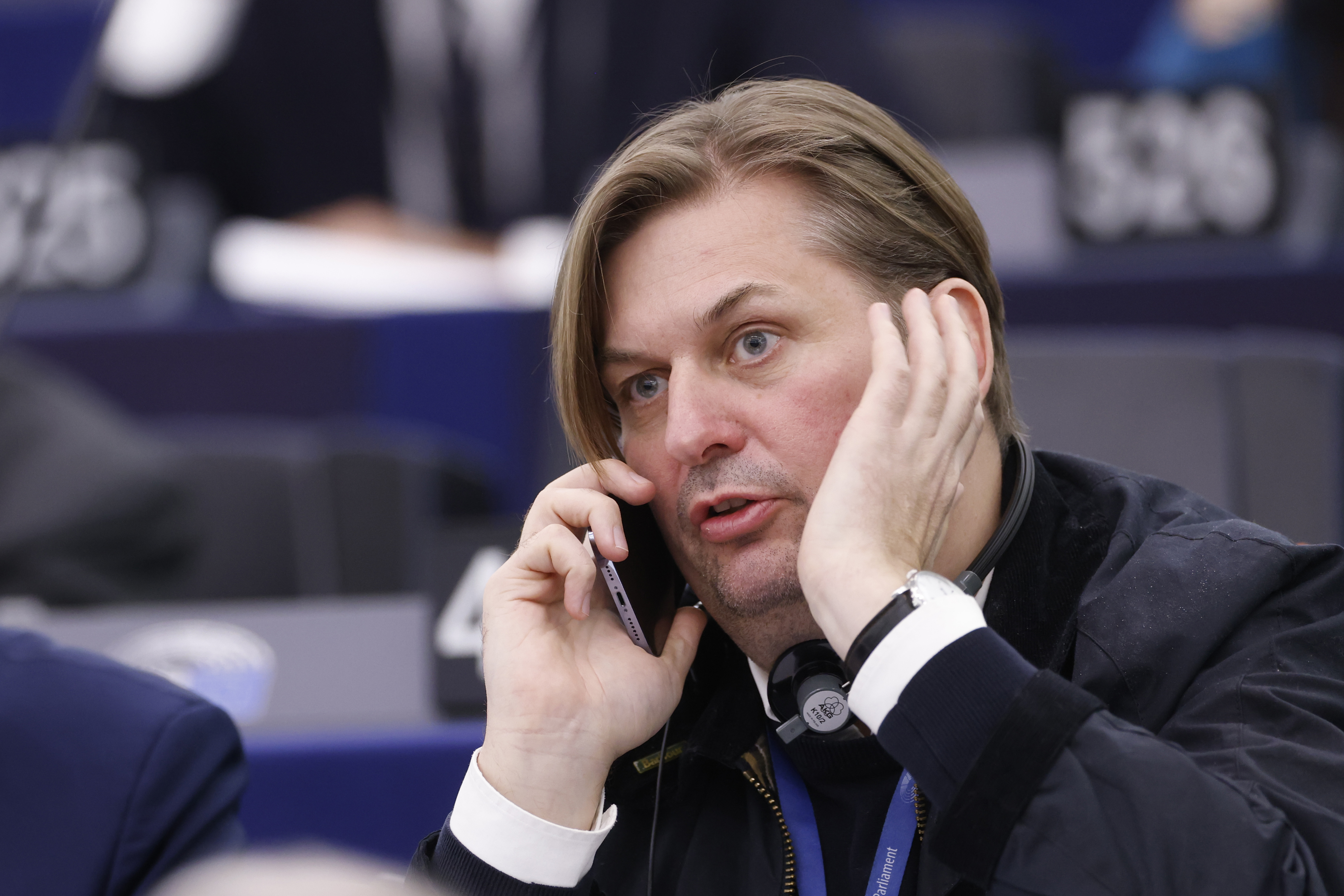Germany's Maximilian Krah, of the far-right Alternative, calls during a session at the European Parliament, Tuesday, April 23, 2024 in Strasbourg, eastern France. A man who works for the prominent German far-right lawmaker in the European Parliament has been arrested on suspicion of spying for China, authorities said Tuesday. (AP Photo/Jean-Francois Badias)