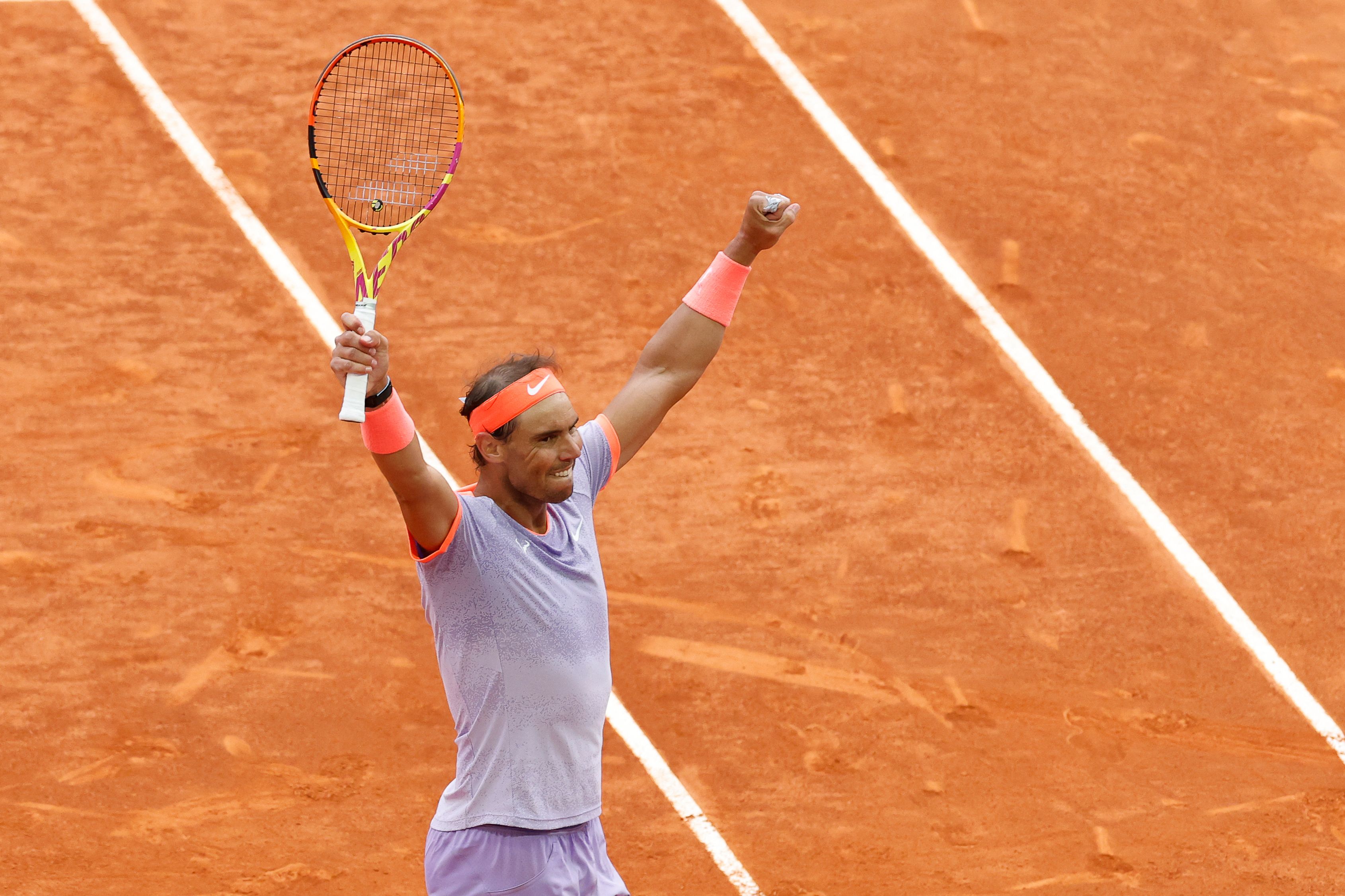 Spain's Rafael Nadal celebrates after winning against Argentina's Pedro Cachin during the third round of the 2024 ATP Tour Madrid Open tournament tennis match at Caja Magica in Madrid on April 29, 2024. (Photo by OSCAR DEL POZO / AFP)