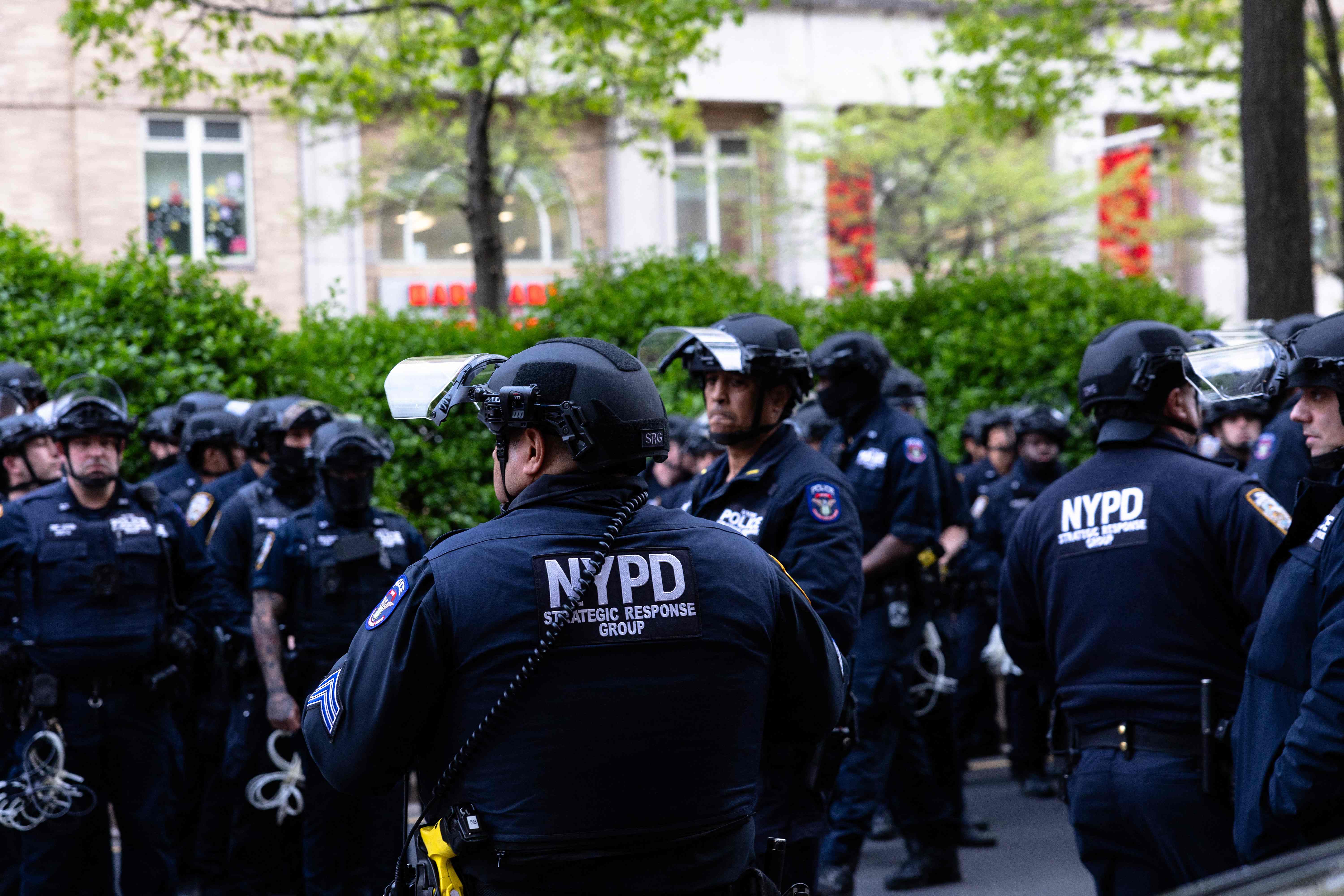 NEW YORK, NEW YORK - APRIL 30: Police mobilize near Columbia University on April 30, 2024 in New York City. The university has limited access to campus to only students residing there and to employees who provide essential services, after protestors took over Hamilton Hall overnight, dubbing it Hind's Hall in honor of Hind Rajab, the six-year-old Palestinian girl who was killed by the Israeli military in January after being the sole survivor of Israeli tank fire on the vehicle in which she had fled with six relatives. Students have barricaded themselves in the building while others have erected another encampment on Lewisohn Lawn outside Lewisohn Hall. The protesters have said they are planning to remain at Hamilton Hall until the university meets their demands.   Michael M. Santiago/Getty Images/AFP (Photo by Michael M. Santiago / GETTY IMAGES NORTH AMERICA / Getty Images via AFP)