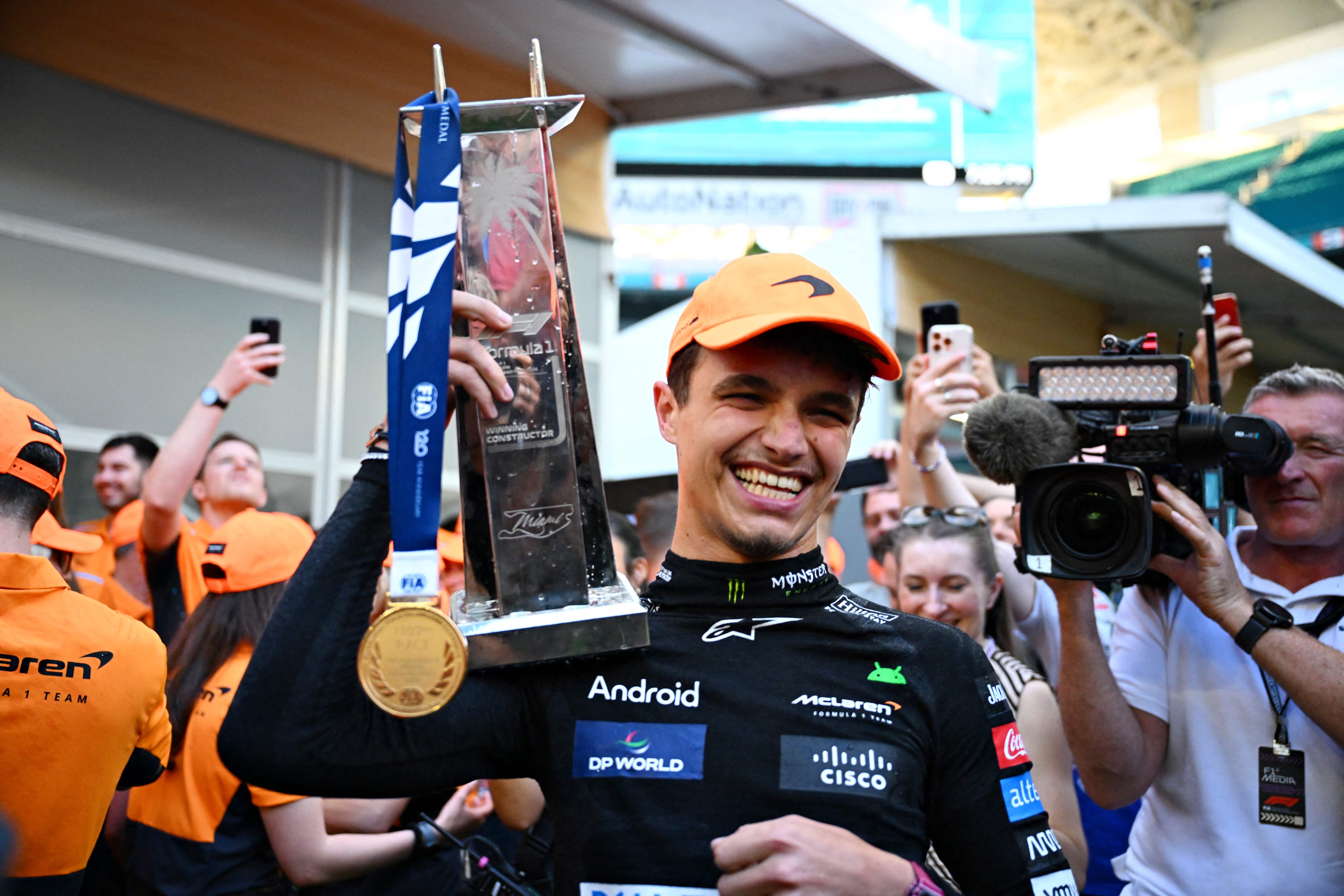 MIAMI, FLORIDA - MAY 05: Race winner Lando Norris of Great Britain and McLaren celebrates with his trophy after the F1 Grand Prix of Miami at Miami International Autodrome on May 05, 2024 in Miami, Florida.   Clive Mason/Getty Images/AFP (Photo by CLIVE MASON / GETTY IMAGES NORTH AMERICA / Getty Images via AFP)